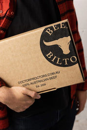 Man holding box of beef jerky